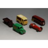 Five loose and playworn Dinky Toys diecast vehicles, to include luxury coach, NCB Electric van,