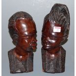 A pair of African carved hardwood tribal busts, h.31cm