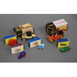 A collection of six boxed diecast toy vehicles to include Matchbox Series Moko Lesney No. 1 traction