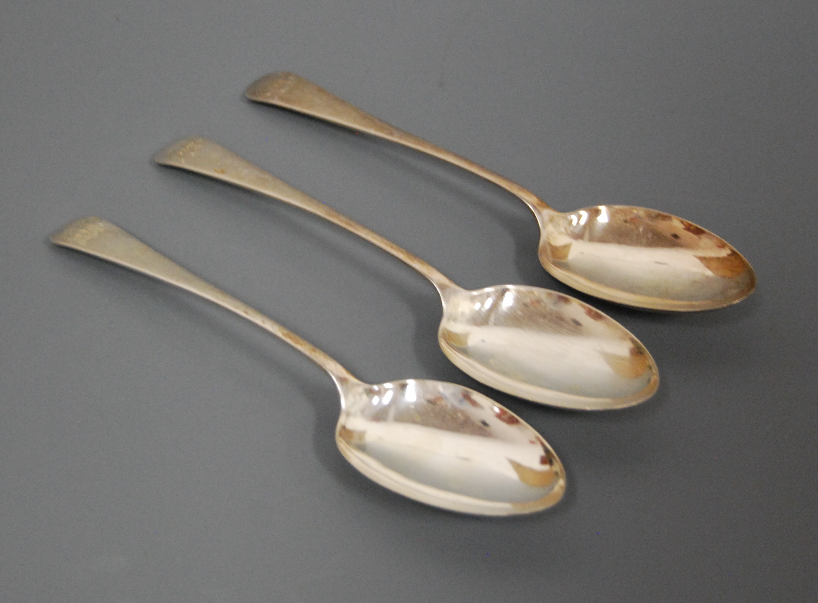 A set of three 20th century silver serving spoons