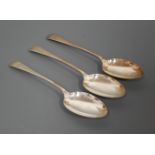 A set of three 20th century silver serving spoons