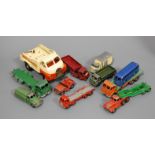 A collection of loose and playworn diecast and tinplate toy vehicles to include Triang Minic