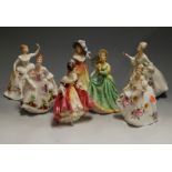 A collection of seven various Royal Doulton figurines, to include Elizabeth HN2946, Marilyn