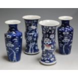 A pair of Chinese blue and white Gu shaped beaker vases, typically decorated with flowering