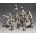 A box of assorted Spanish porcelain figures, to include pair of Nao swan vases, various clowns etc