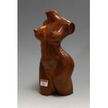 A modern carved hardwood sculpture of a female nude torso, h.30cm