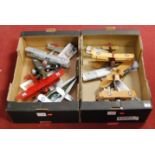 Two boxes containing eight various modern tinplate replica model aircraft to include a Fokker