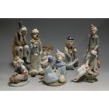 A collection of seven Casades Spanish porcelain clown figures, tallest h.27cm