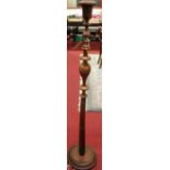 An Indian part relief carved teak standard lamp, height (excluding fittings) 151cm