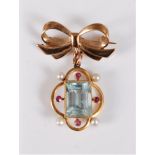 An aquamarine, ruby and cultured pearl pendant/brooch, the step cut aquamarine, approx. 14.5 x 10.