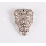 An Art Deco diamond dress clip, of stepped form and the pointed top set with a single square step