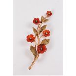 A late 19th century 15ct carnelian and diamond brooch, the five graduated carnelian flowerheads,