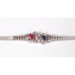 A contemporary 18ct white gold, ruby, sapphire and diamond set bracelet, arranged as two