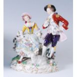 A Sitzendorf porcelain figure group as a Shepherd and Shepherdess courtship scene, each in 18th