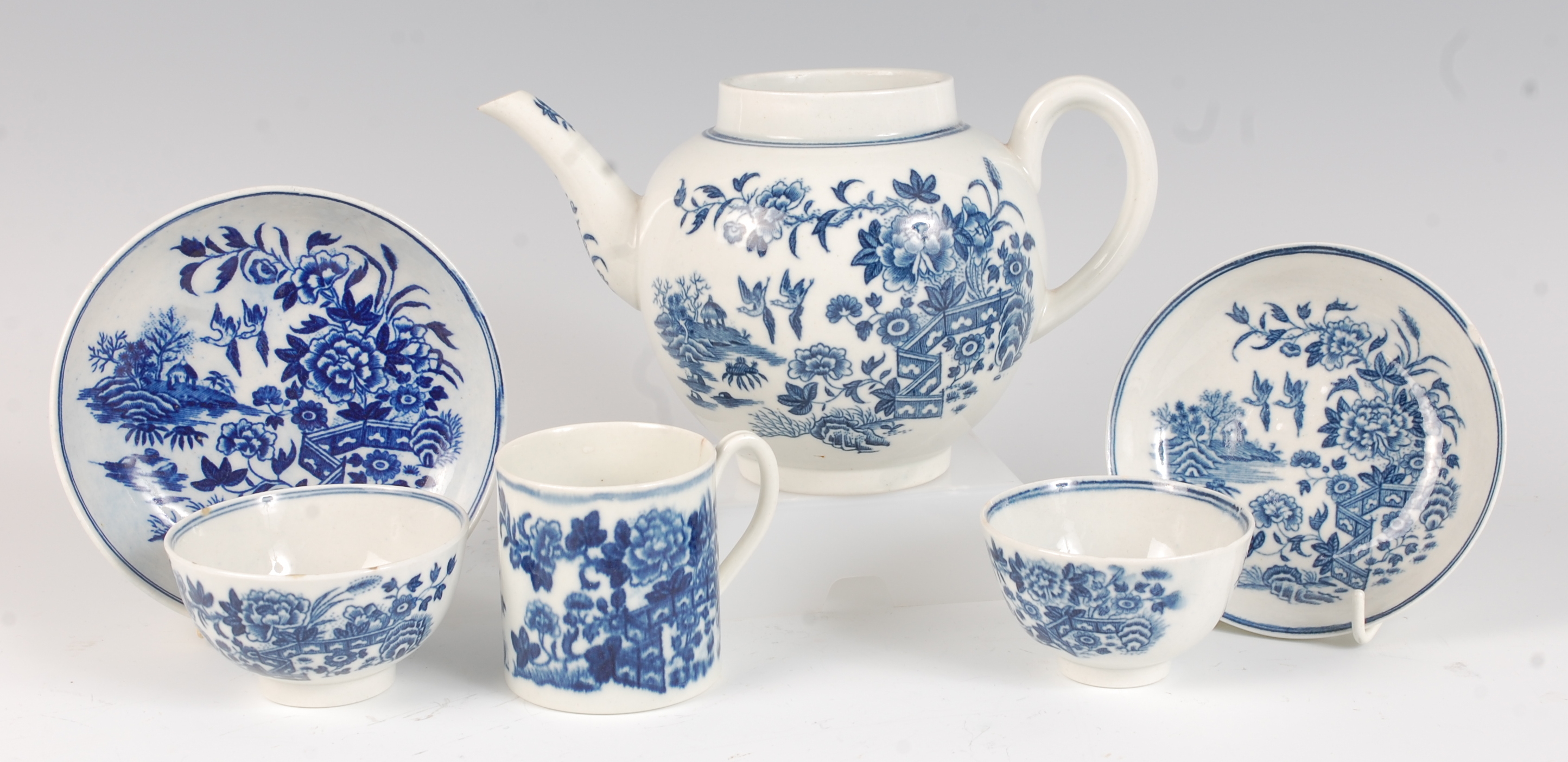 A Worcester porcelain bullet shaped teapot, underglaze blue decorated in the Fence pattern (