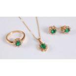 An 18ct emerald and diamond suite, comprising of a ring, necklace and matching earstuds, each as a