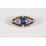 A late 19th/early 20th century sapphire, diamond, 'pearl' and white enamel brooch, the central