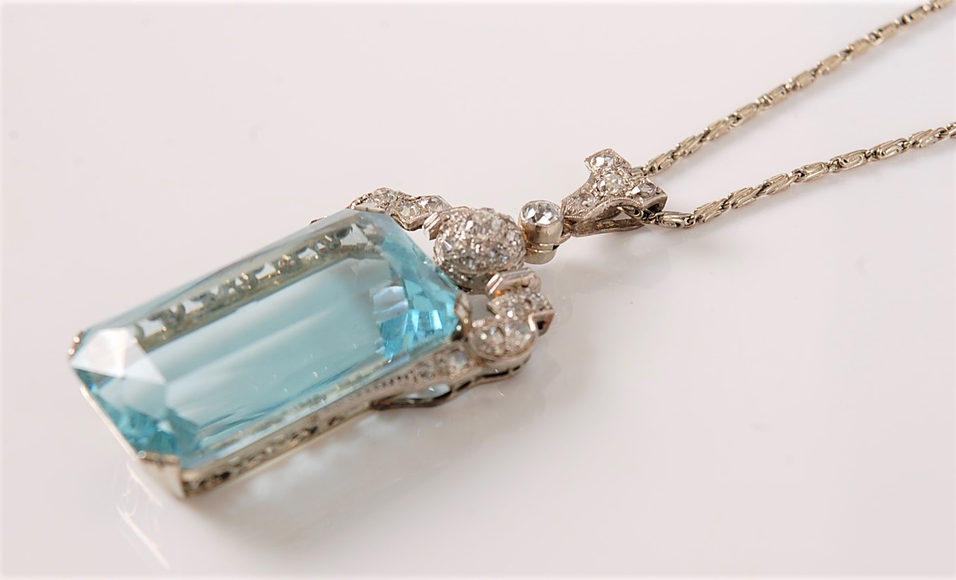 An Art Deco aquamarine and diamond pendant, the emerald cut aquamarine measuring, approx. 27 x 15. - Image 2 of 10