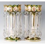 A pair of 19th century Bohemian opaline and green glass overlaid pedestal table lustres, the