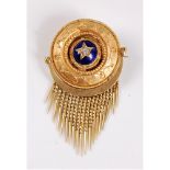 A Victorian Etruscan revival fringe brooch, the round brooch set to centre with a single old mine