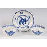 A Worcester porcelain tea bowl and saucer, blue and white printed in the Fruit & Wreath pattern;