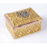 A George III gilt metal snuff-box, of rectangular form, having chased decoration, the hinged cover