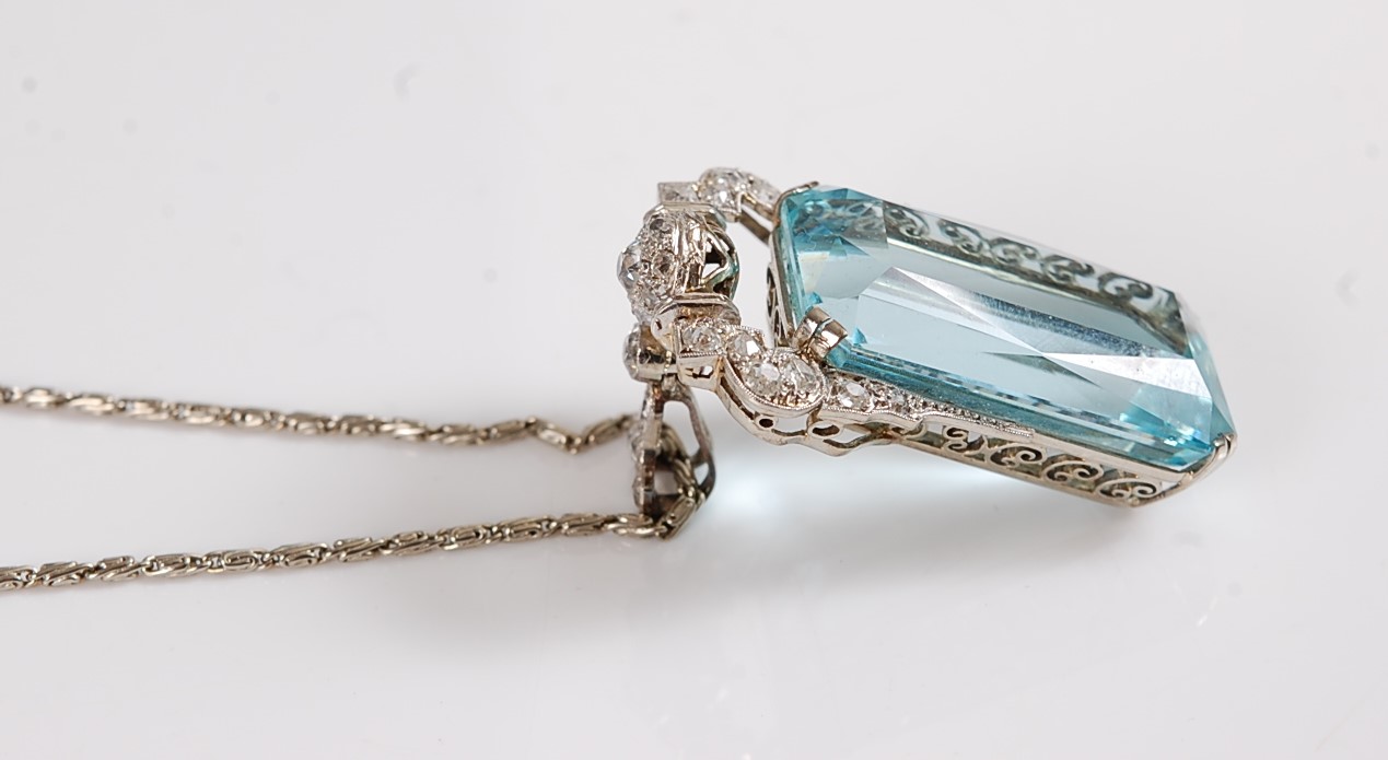 An Art Deco aquamarine and diamond pendant, the emerald cut aquamarine measuring, approx. 27 x 15. - Image 5 of 10