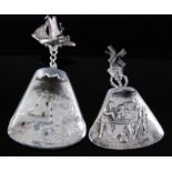 A 19th century German silver caddy spoon, the triangular bowl embossed with boats upon a river