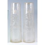 A pair of Victorian acid etched and thumb-cut glass vases, of slightly flaring cylindrical form,