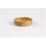 A posy ring, possibly 17th century, the 5mm wide band with floral and scrolled decoration, the inner