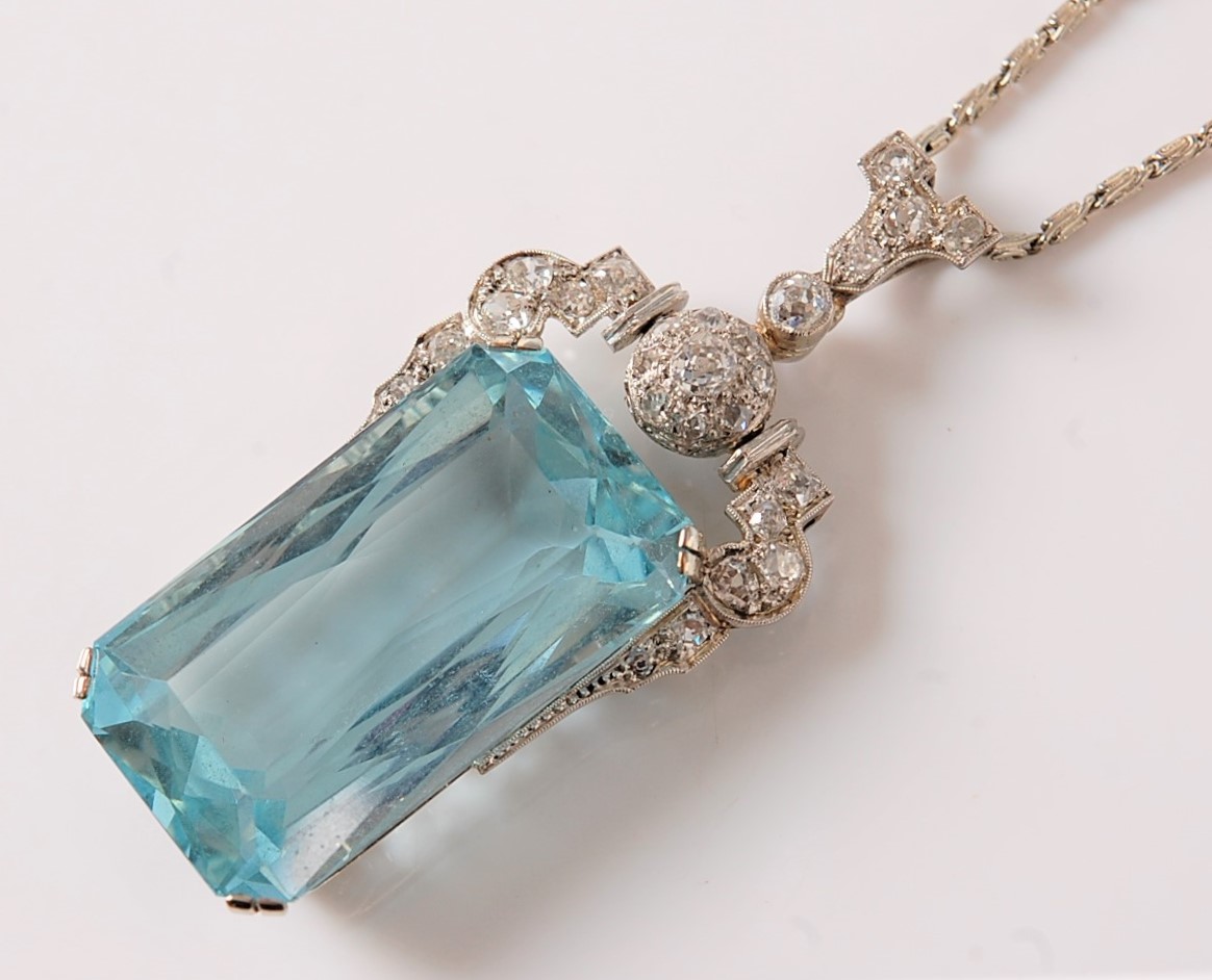 An Art Deco aquamarine and diamond pendant, the emerald cut aquamarine measuring, approx. 27 x 15. - Image 3 of 10