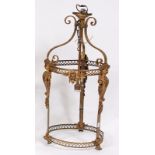 An early 20th century gilt metal ceiling lantern, of cylindrical form (lacking glass), having