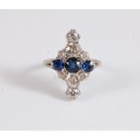 An early 20th century 18ct sapphire and diamond ring, the three graduated oval sapphires, set