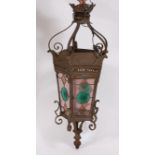 A late 19th century brass hanging lantern, having a central crown boss supporting five wrought brass