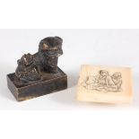 A small Chinese bronze seal, modelled as a foo dog, 3.1cm; together with an Oriental relief carved