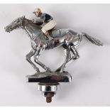 Louis Lejeune, a chrome car mascot in the form of a racehorse and jockey, stamped verso LL within