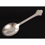 A Geo. V. silver trefid spoon, having an embossed rat tail bowl and further embossed terminal with