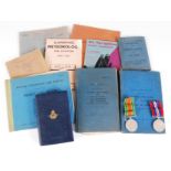 A WW II R.C.A.F. Flying Log Book, naming LAC E.F. Smart, together with Defence and War medals and