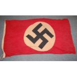 A German N.S.D.A.P flag, stamped to the lanyard Hamburg N.S.D.A.P. and dated 1944, 85 x 150cm.