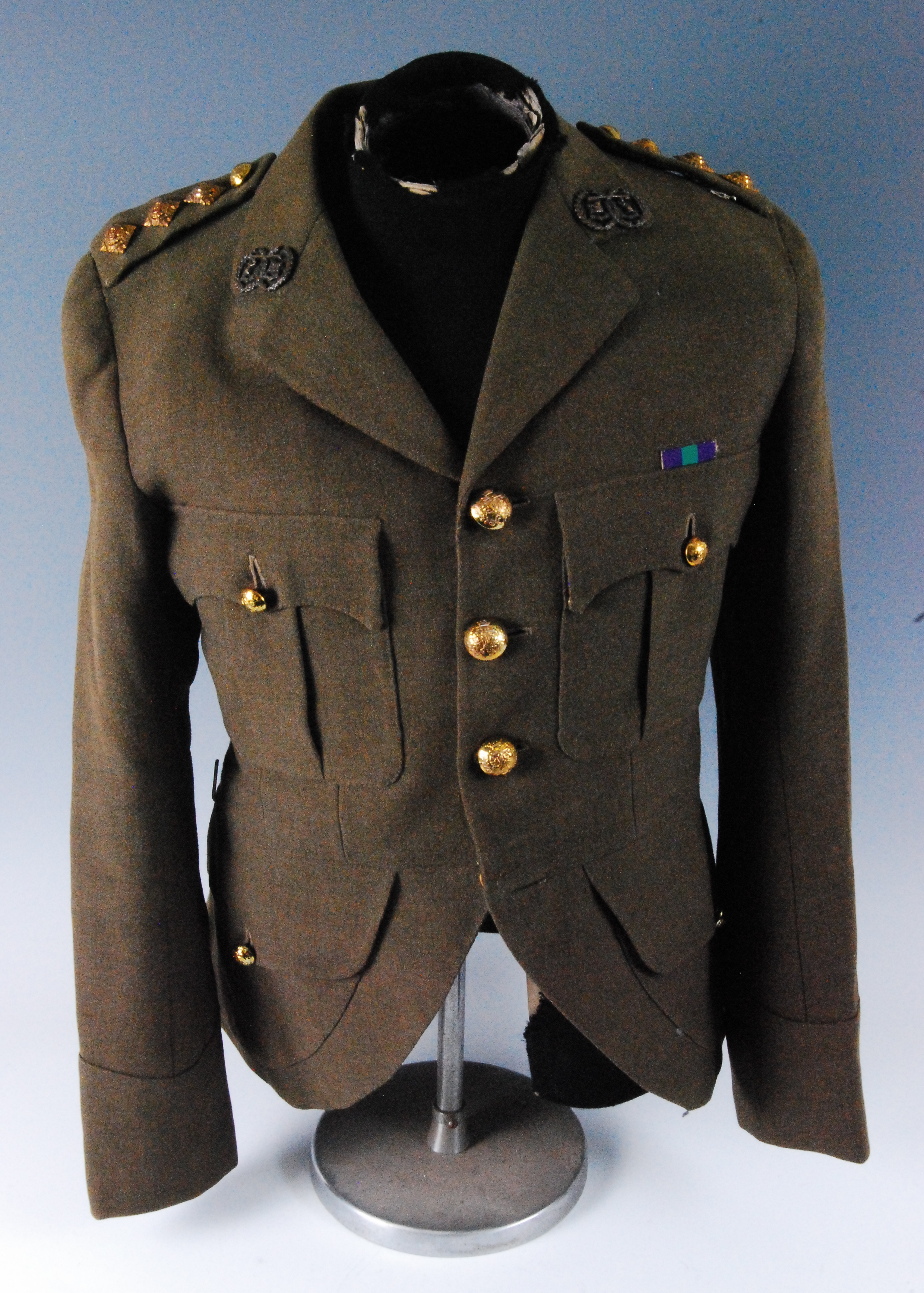 A post WW II battle dress blouse, bearing a label for Wm Anderson & Sons, naming Duncan Darroch Junr