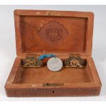 An early 20th century Indian hardwood table cigarette box, the interior lid carved with the Essex