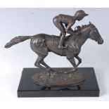 David Cornell, 20th century, Champion Finish, bronze racehorse with jockey up, on a naturalistic