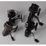 A J.W. Young & Sons The Ambidex No.2 fixed spool casting reel, together with three Mitchell fixed