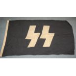 A German SS flag on a black field with white SS runes, with various faint stamps to the lanyard