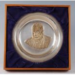 A silver plate "The Churchill Centenary Trust Plate" designed by David Cornell, the centre with