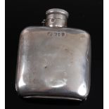 A small late Victorian silver hip flask of plain undecorated form, maker William Hutton & Sons