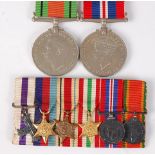 A group of six miniature medals to include Military Cross, 1939-45 Star, Africa Star, Italy Star,