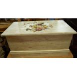 A contemporary white washed and part decoupage clad pine child's toy box with removable lid, width