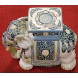 A contemporary Chinese glazed stoneware elephant seat (with losses to glazing throughout)