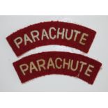 A pair of Parachute Regiment cloth shoulder titles